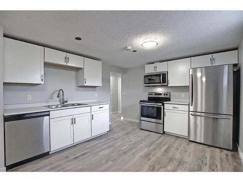 2011 39 Street Se, Calgary, AB - Indoor Photo Showing Kitchen