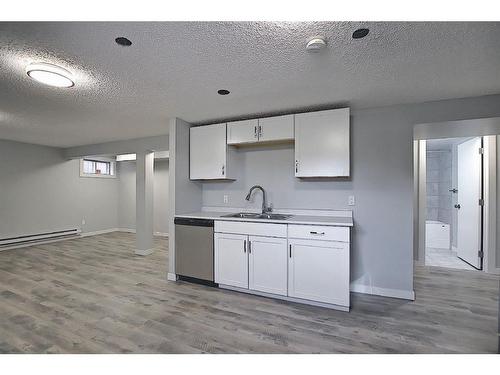 2011 39 Street Se, Calgary, AB - Indoor Photo Showing Kitchen With Double Sink