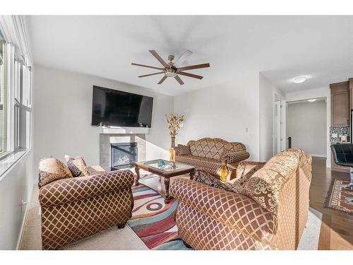 55 Walden Place Se, Calgary, AB - Indoor Photo Showing Living Room With Fireplace