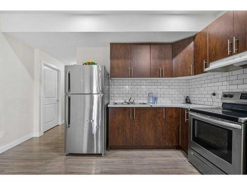 55 Walden Place Se, Calgary, AB - Indoor Photo Showing Kitchen With Stainless Steel Kitchen With Double Sink With Upgraded Kitchen