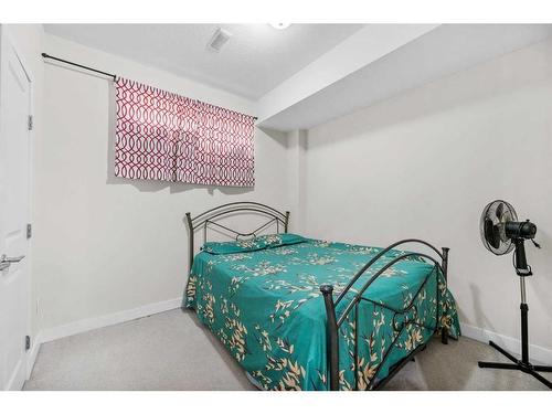 55 Walden Place Se, Calgary, AB - Indoor Photo Showing Bedroom