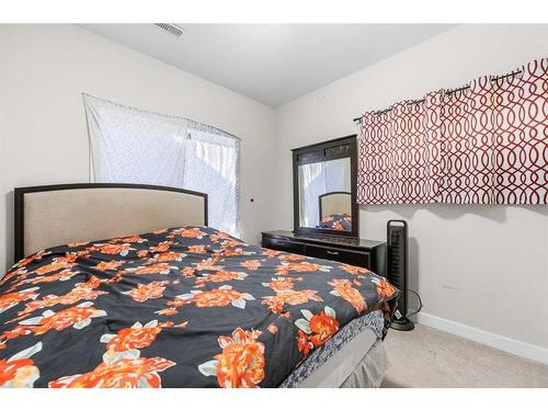 55 Walden Place Se, Calgary, AB - Indoor Photo Showing Bedroom