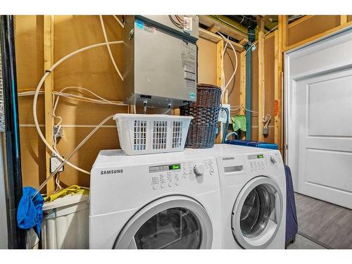 55 Walden Place Se, Calgary, AB - Indoor Photo Showing Laundry Room