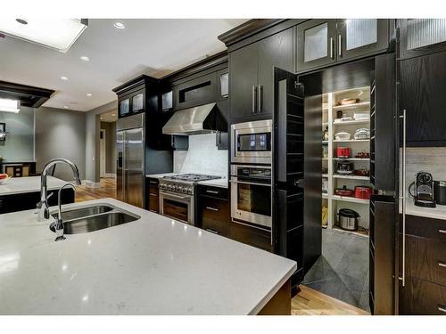 16 Spring Valley Way Sw, Calgary, AB - Indoor Photo Showing Kitchen With Double Sink With Upgraded Kitchen