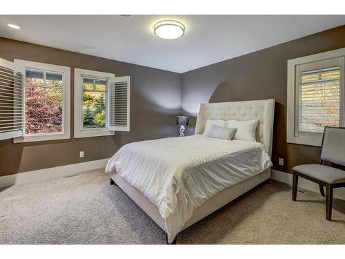 16 Spring Valley Way Sw, Calgary, AB - Indoor Photo Showing Bedroom