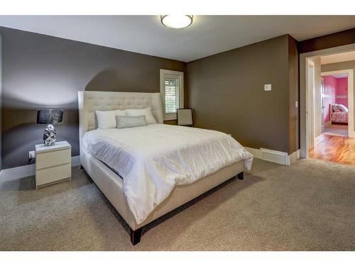 16 Spring Valley Way Sw, Calgary, AB - Indoor Photo Showing Bedroom