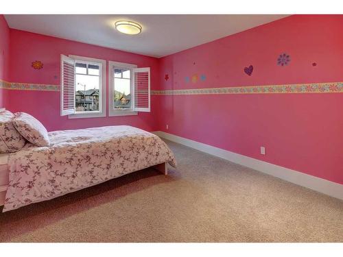 16 Spring Valley Way Sw, Calgary, AB - Indoor Photo Showing Bedroom