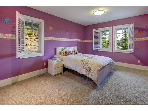 16 Spring Valley Way Sw, Calgary, AB - Indoor Photo Showing Bedroom