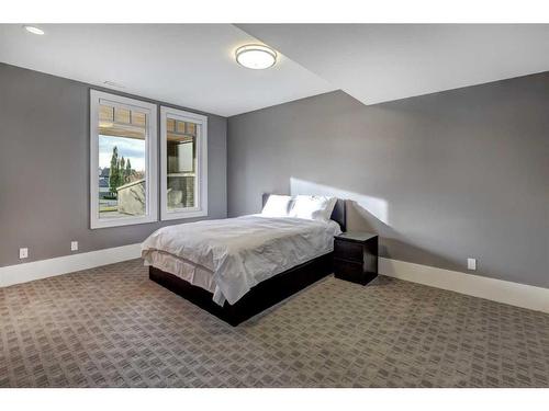 16 Spring Valley Way Sw, Calgary, AB - Indoor Photo Showing Bedroom