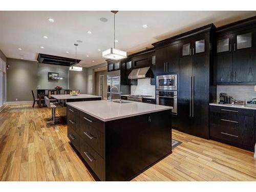 16 Spring Valley Way Sw, Calgary, AB - Indoor Photo Showing Kitchen With Upgraded Kitchen