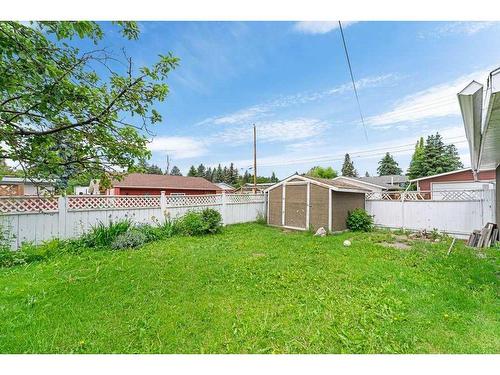 608 104 Avenue Sw, Calgary, AB - Outdoor With Backyard