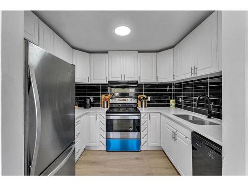 6736 43 Avenue Ne, Calgary, AB - Indoor Photo Showing Kitchen With Stainless Steel Kitchen