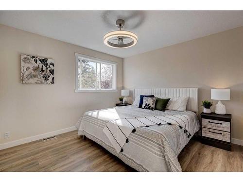 11 Millrose Place Sw, Calgary, AB - Indoor Photo Showing Bedroom