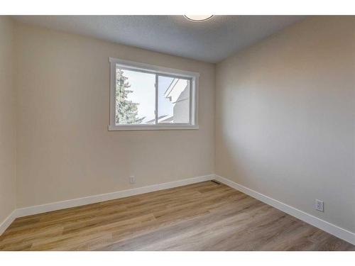 11 Millrose Place Sw, Calgary, AB - Indoor Photo Showing Other Room