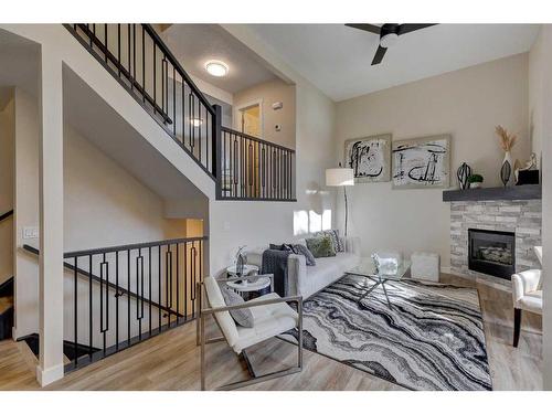 11 Millrose Place Sw, Calgary, AB - Indoor With Fireplace