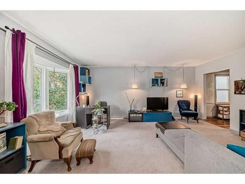 2212 26A Street Sw, Calgary, AB - Indoor Photo Showing Living Room With Fireplace