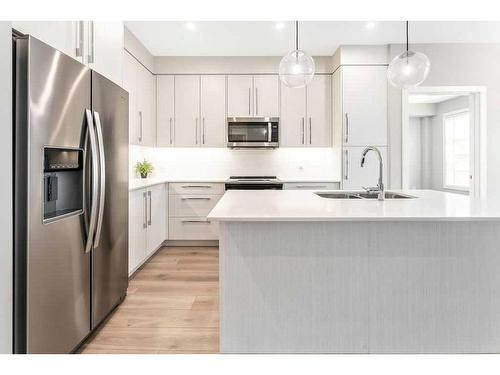 223-383 Smith Street Nw, Calgary, AB - Indoor Photo Showing Kitchen With Stainless Steel Kitchen With Upgraded Kitchen