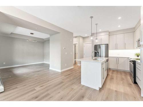 223-383 Smith Street Nw, Calgary, AB - Indoor Photo Showing Kitchen With Stainless Steel Kitchen With Upgraded Kitchen