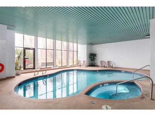 1001-300 Meredith Road Ne, Calgary, AB - Indoor Photo Showing Other Room With In Ground Pool