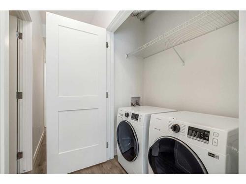 202-20 Sage Hill Nw, Calgary, AB - Indoor Photo Showing Laundry Room