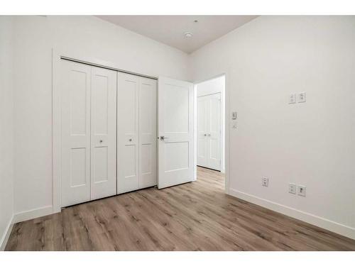 202-20 Sage Hill Nw, Calgary, AB - Indoor Photo Showing Other Room