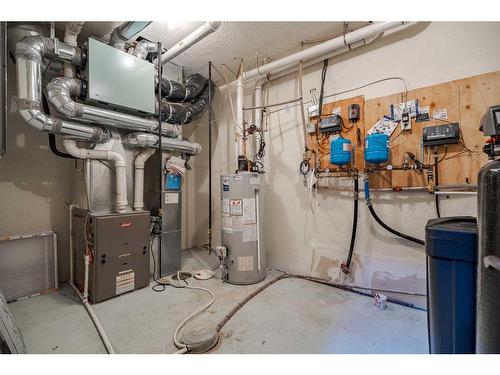 244122 Conrich Road, Rural Rocky View County, AB - Indoor Photo Showing Basement