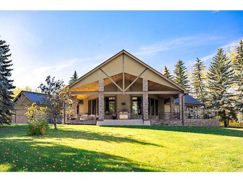 244122 Conrich Road, Rural Rocky View County, AB - Outdoor With Deck Patio Veranda With Facade