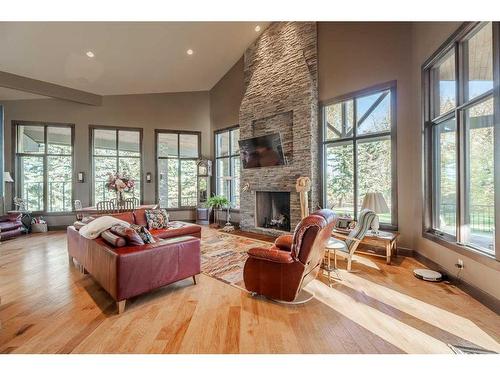 244122 Conrich Road, Rural Rocky View County, AB - Indoor Photo Showing Living Room With Fireplace