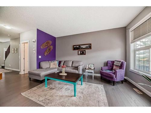 264 Rockyspring Grove Nw, Calgary, AB - Indoor Photo Showing Living Room