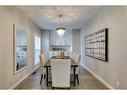 65 Discovery Ridge Road Sw, Calgary, AB  - Indoor Photo Showing Dining Room 