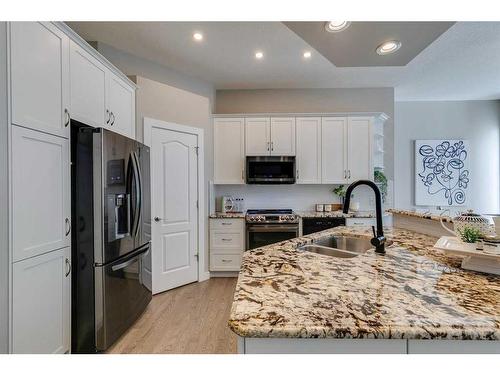 65 Discovery Ridge Road Sw, Calgary, AB - Indoor Photo Showing Kitchen With Double Sink With Upgraded Kitchen