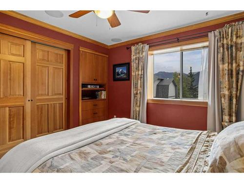 70-200 Glacier Drive, Canmore, AB - Indoor Photo Showing Bedroom