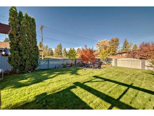 14203 Parkland Boulevard Se, Calgary, AB - Outdoor With Backyard