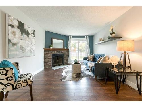 3101-13045 6 Street Sw, Calgary, AB - Indoor Photo Showing Living Room With Fireplace