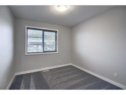 306 Sundown Road, Cochrane, AB - Indoor Photo Showing Other Room