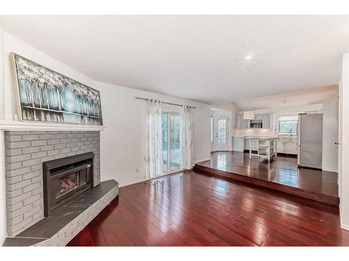 832 Sierra Morena Place Sw, Calgary, AB - Indoor Photo Showing Living Room With Fireplace