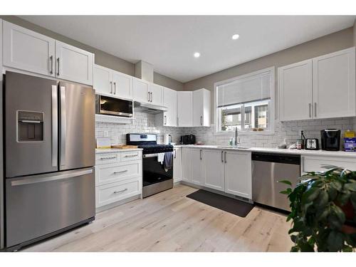 102-130 Redstone Walk Ne, Calgary, AB - Indoor Photo Showing Kitchen With Upgraded Kitchen