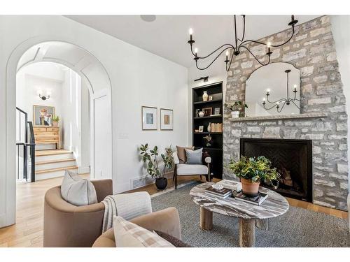 370 Capri Crescent Nw, Calgary, AB - Indoor Photo Showing Living Room With Fireplace