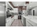 2002 38 Street Se, Calgary, AB  - Indoor Photo Showing Kitchen With Stainless Steel Kitchen With Upgraded Kitchen 