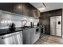 2108-930 6 Avenue Sw, Calgary, AB  - Indoor Photo Showing Kitchen With Stainless Steel Kitchen With Double Sink With Upgraded Kitchen 