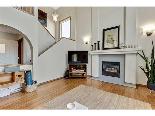 234 Mt Assiniboine Place Se, Calgary, AB - Indoor Photo Showing Living Room With Fireplace