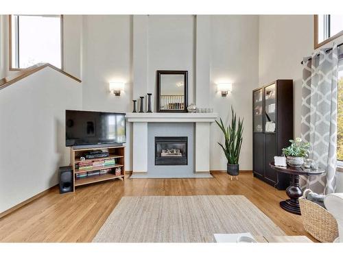 234 Mt Assiniboine Place Se, Calgary, AB - Indoor Photo Showing Living Room With Fireplace