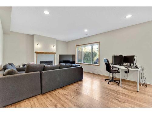 234 Mt Assiniboine Place Se, Calgary, AB - Indoor Photo Showing Living Room With Fireplace