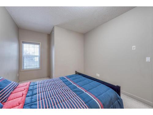 2609-11811 Lake Fraser Drive Se, Calgary, AB - Indoor Photo Showing Bedroom