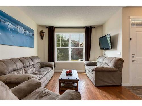 242 Cranford Way Se, Calgary, AB - Indoor Photo Showing Living Room