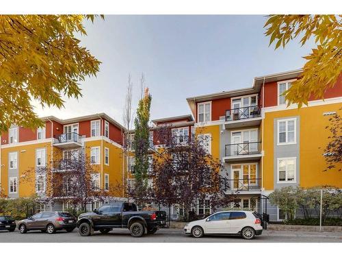 218-208 Holy Cross Sw, Calgary, AB - Outdoor With Balcony With Facade