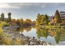 218-208 Holy Cross Sw, Calgary, AB  - Outdoor With Body Of Water With View 