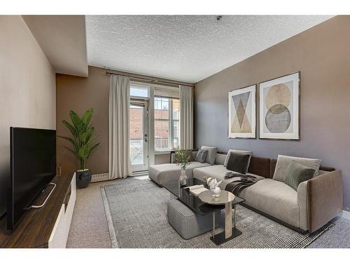 218-208 Holy Cross Sw, Calgary, AB - Indoor Photo Showing Living Room