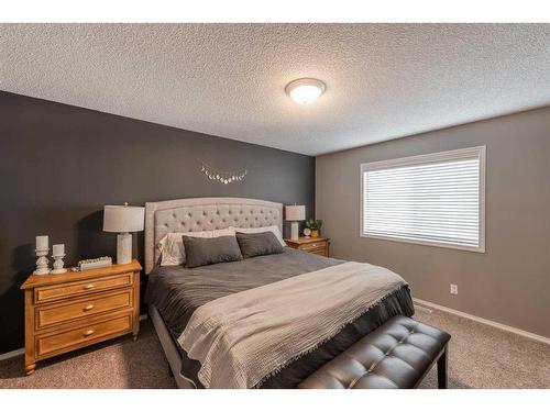 66 Bridleridge Crescent Sw, Calgary, AB - Indoor Photo Showing Bedroom