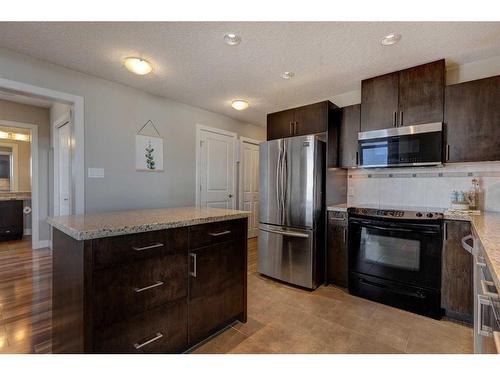 1006-77 Spruce Place Sw, Calgary, AB - Indoor Photo Showing Kitchen With Stainless Steel Kitchen